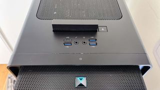 Acer Predator Orion 7000 on a desk showing a close-up of the top ports
