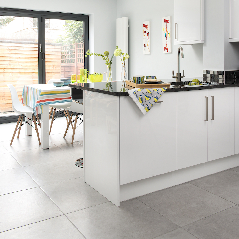 kitchen room with tiled flooring and kitchen countertop