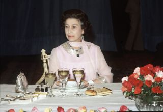 Queen Elizabeth II at a State banquet. (Photo by Anwar Hussein/Getty Images)