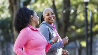 women walking together outside for workout motivation