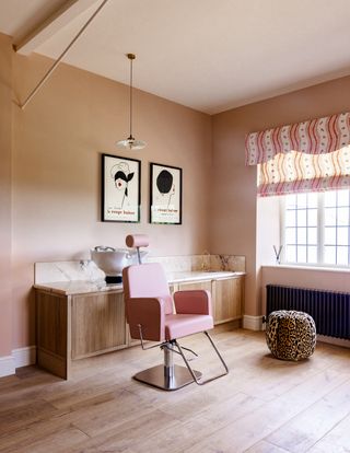 Pink salon with red patterned pelmet