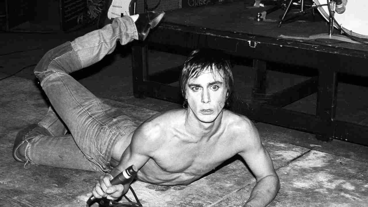 Iggy Pop performing onstage in 1975