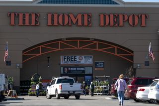 Shoppers enter a Home Depot store in Pleasanton, California, U.S., on Monday, Feb. 22, 2021. Home Depot Inc. is expected to release earnings figures on February 23.