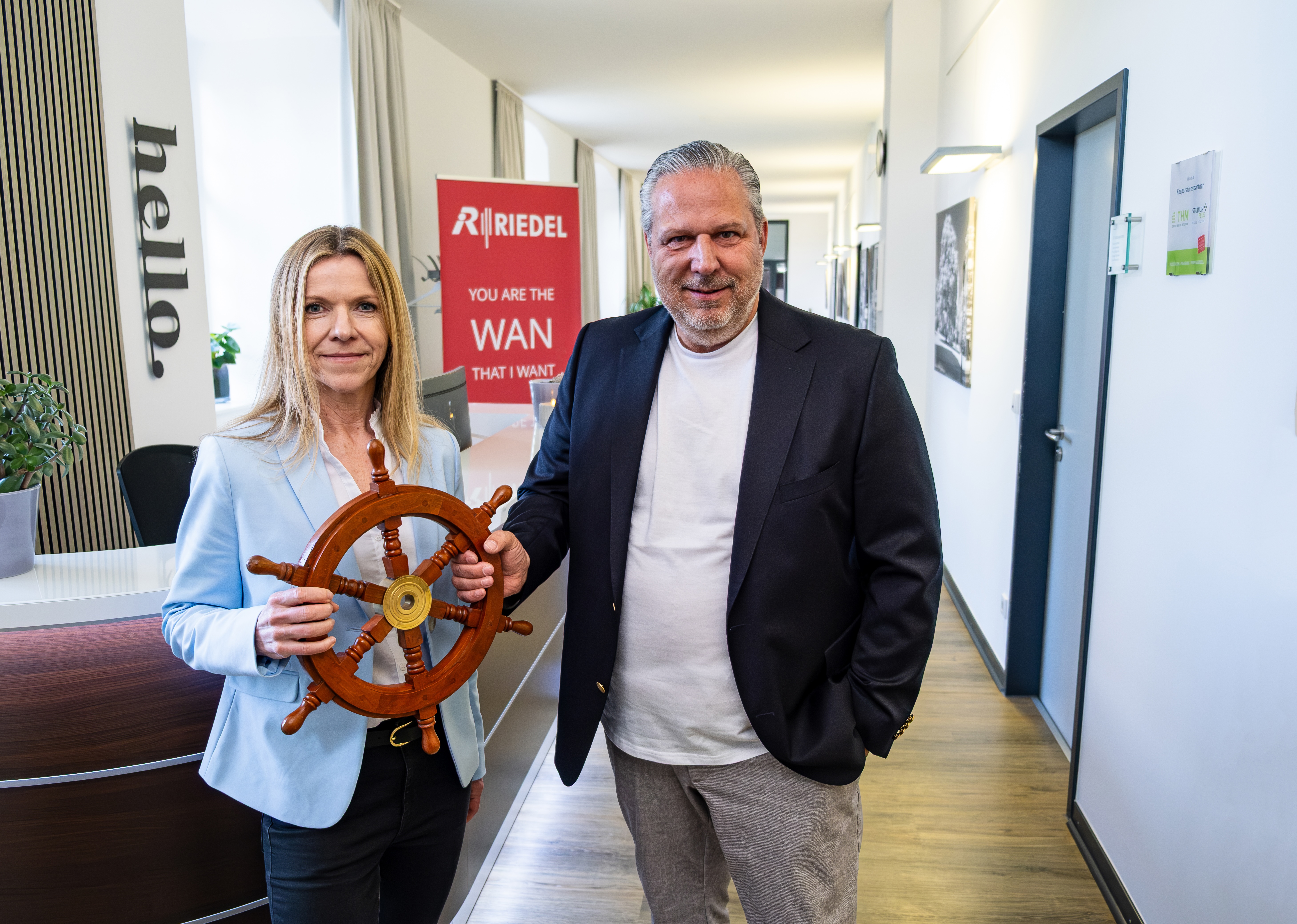 Gudrun Scharler, new CEO of Riedel Networks (left), with former CEO Michael Martens, (right).