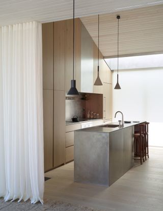 Minimalist kitchen by Studio DIAA