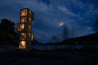 seljord watchtower lit up with lights inside the tower