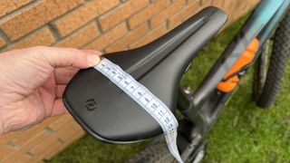 saddle and tape measure
