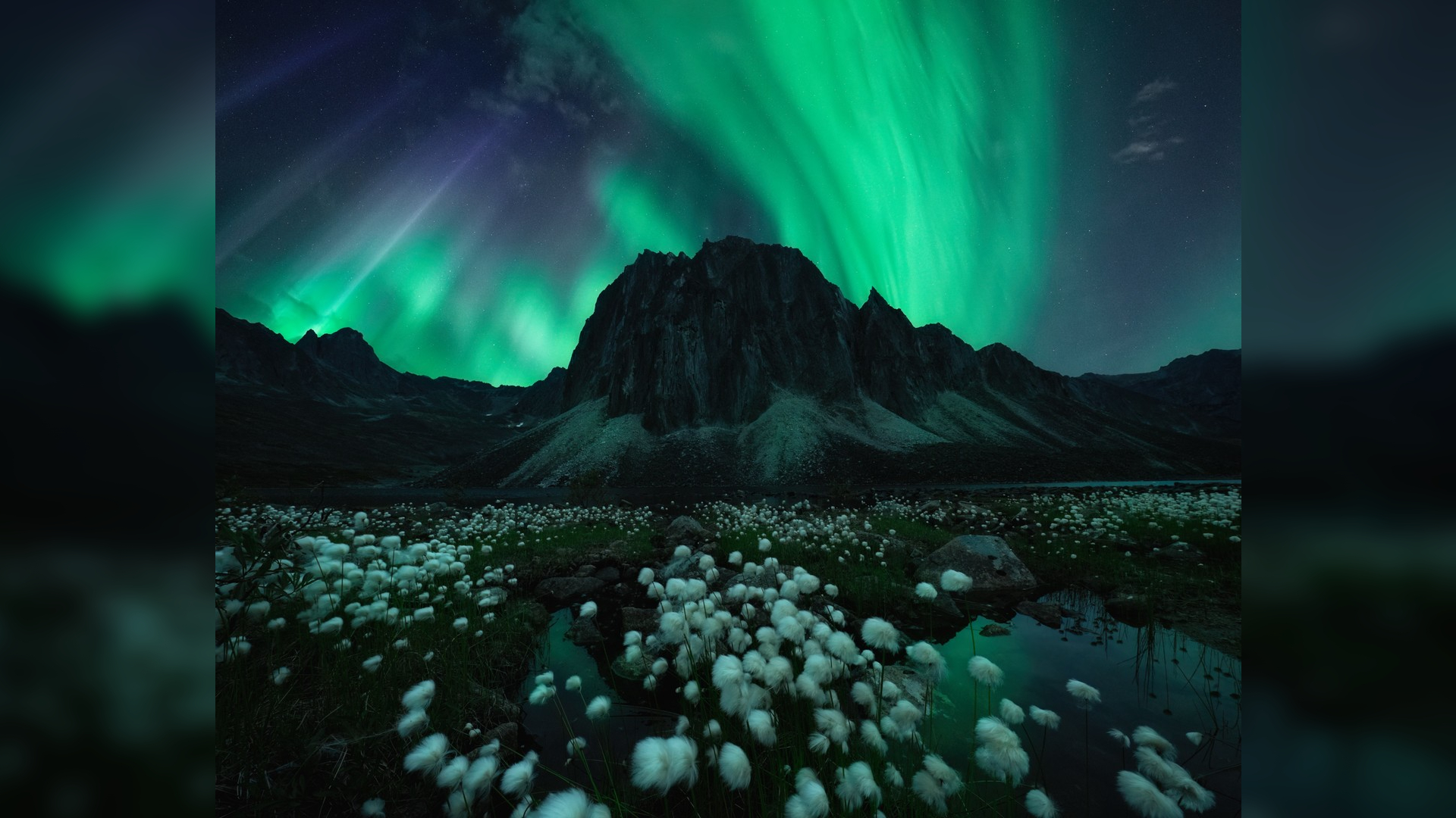 A photo of the northern lights, part of the travel photography blog Capture the Atlas 2022 Northern Lights Photographer of the Year collection. This image was taken by Rachel Jones Ross.