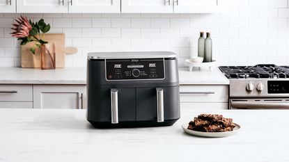 Image of Instant Dual Zone air fryer on the countertop of a kitchen on a countertop 