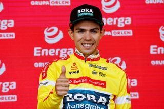 Sergio Higuita (Bora-Hansgrohe) gives the thumbs up on the podium after stage 5 of the 2022 Tour de Pologne