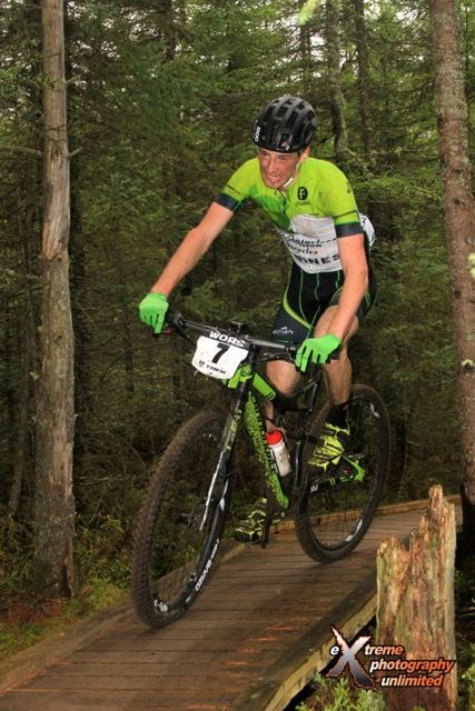 Neff hangs onto the slick bridge