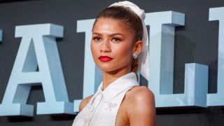 Close up of Zendaya in a white dress at the London premiere of Challengers on April 10, 2024.