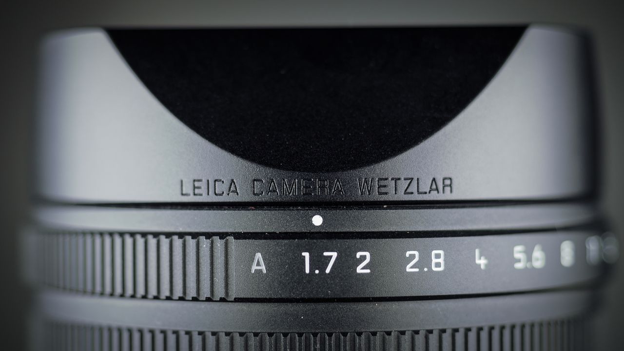 Leica Q3 Monochrom on a wooden surface