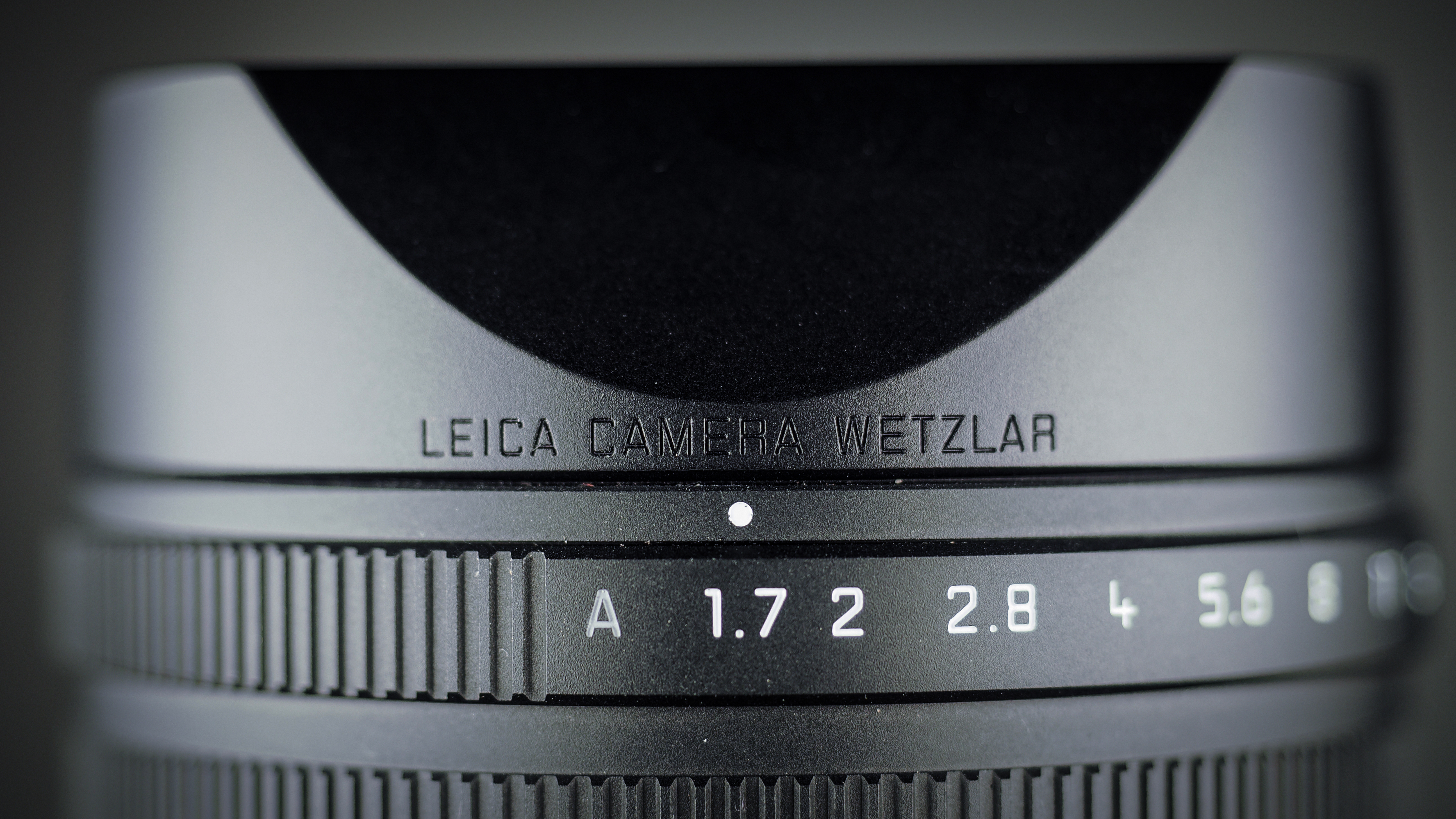 Leica Q3 Monochrom on a wooden surface