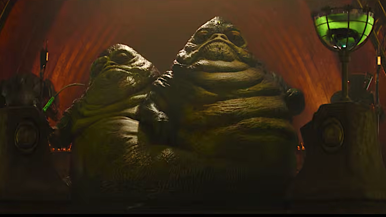 Two slug-like aliens from a sci-fi movie