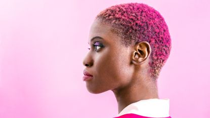 woman with short pink hair from using hair dye