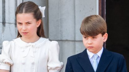 Princess Charlotte and Prince Louis watch an RAF flypast from the balcony of Buckingham Palace during Trooping The Colour on June 13, 2026