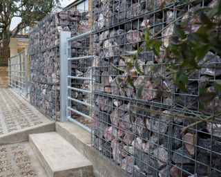 gabion wall at the front of a house