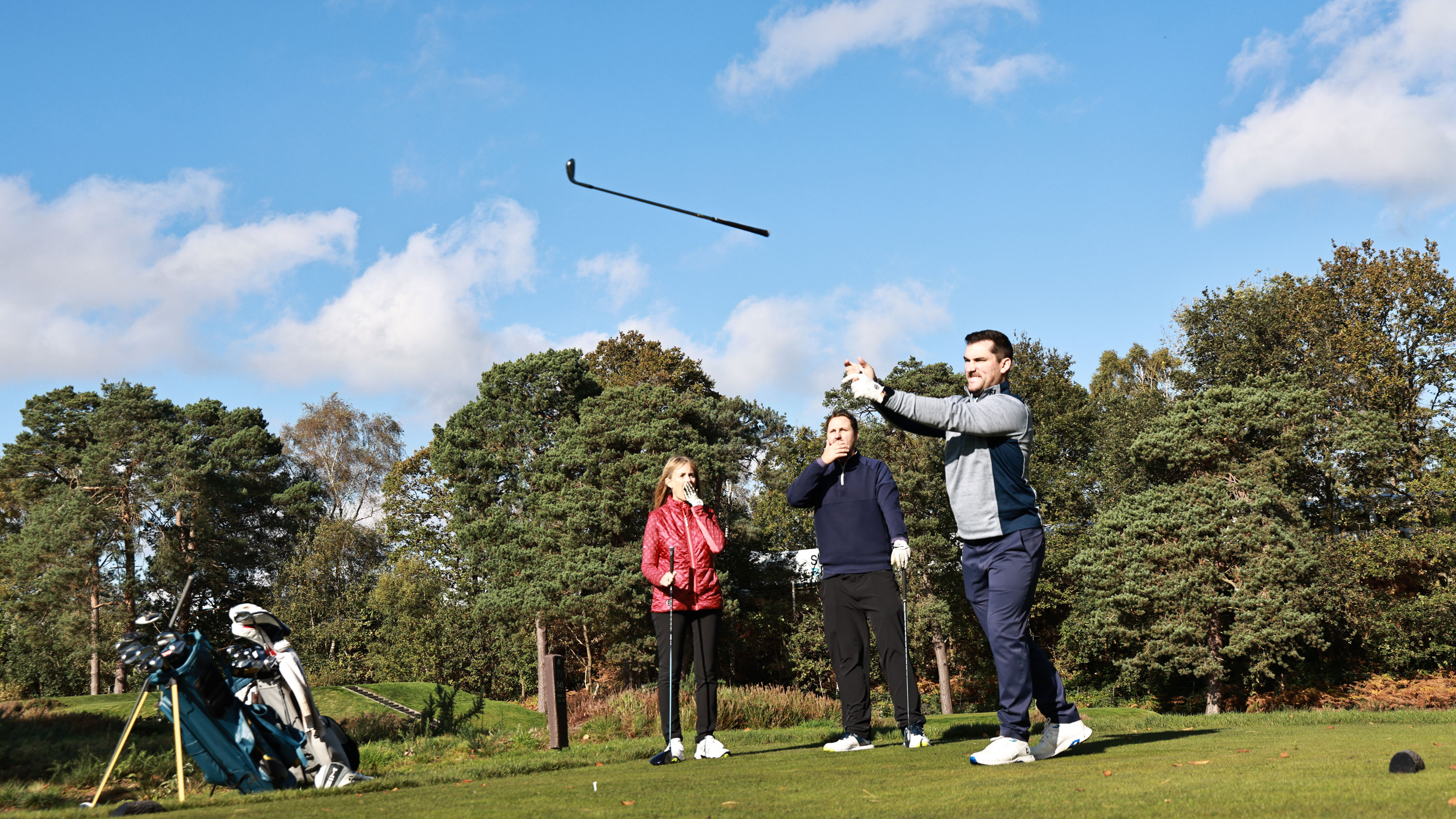 A player throws a club in anger