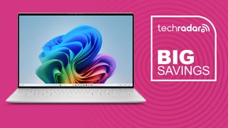 A Dell XPS 13 against a TechRadar BIG SAVINGS background