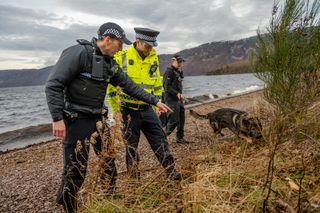 Checking out clues in Highland Cops.