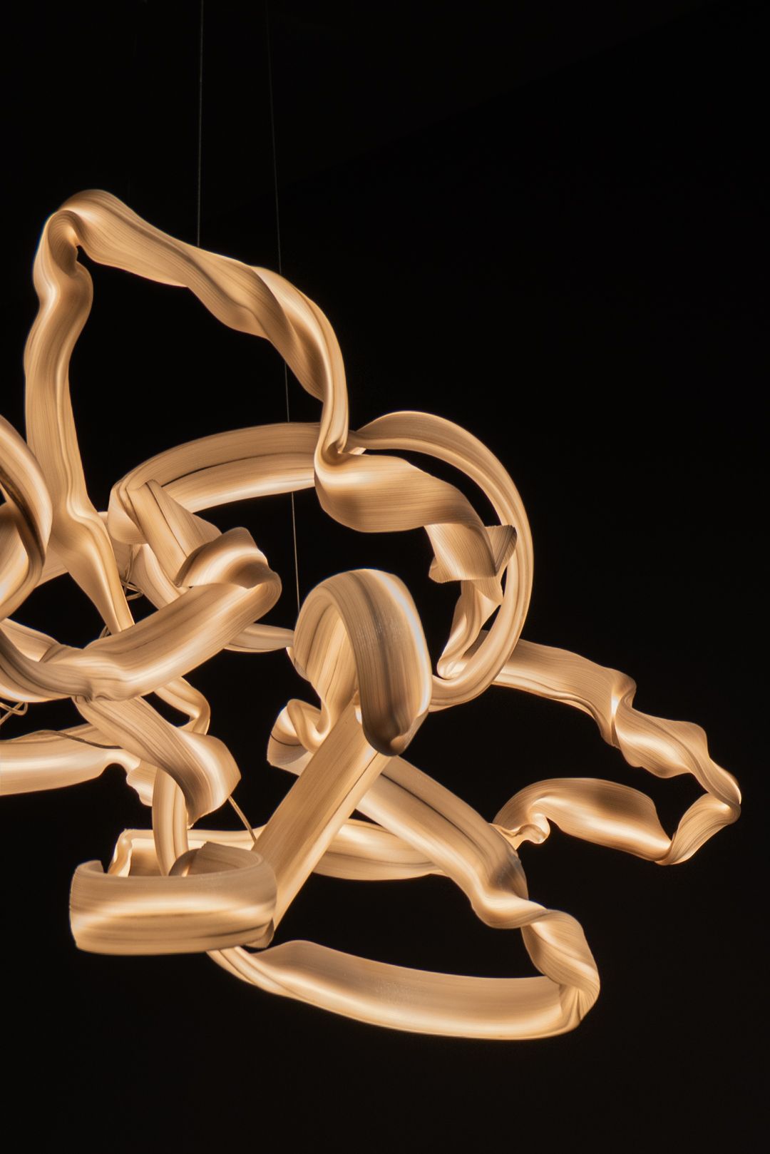artwork displayed in black gallery space