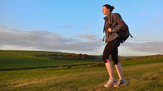 what is a fleece: hiker wearing a fleece