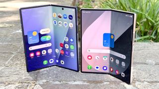 Galaxy Z Fold 7 and Galaxy Z Fold 6 shown on a stone wall