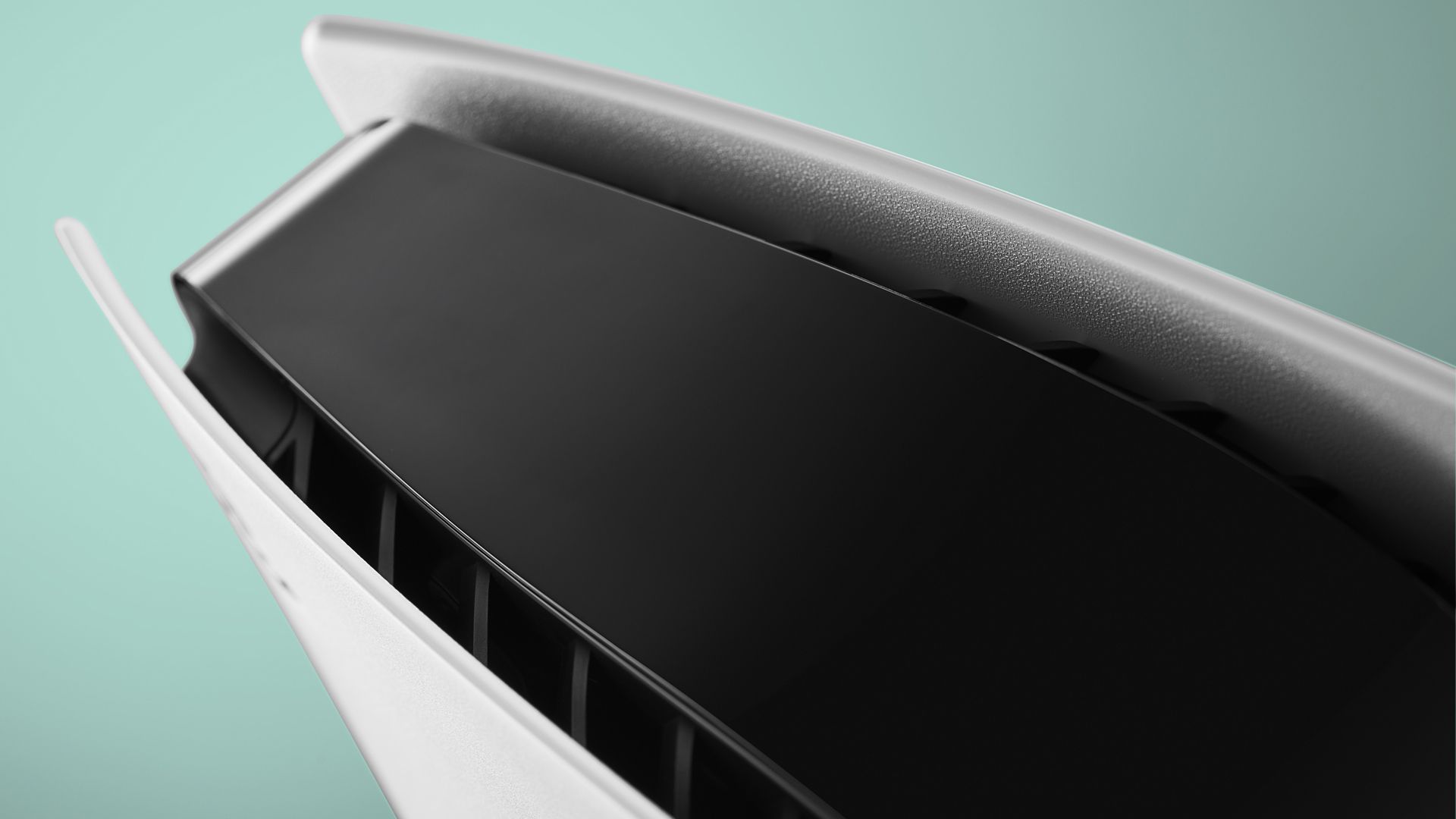 The PS5 console shot top-down with its cooling vents visible