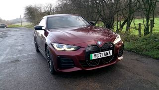 bmw i4 on country lane