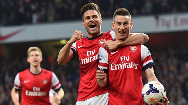 Olivier Giroud and Laurent Koscielny of Arsenal