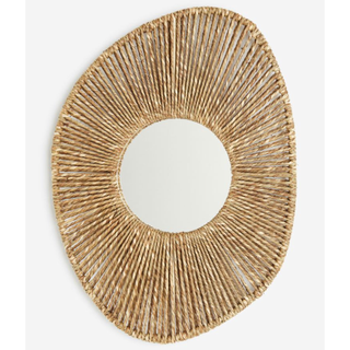 wall mirror with a large frame of woven seagrass