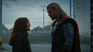 Natalie Portman on the left, talking to Chris Hemsworth (as Thor) in Thor: The Dark World