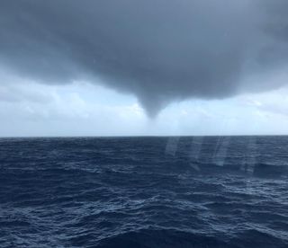 The water spout, as seen from research vessel Point Sur.