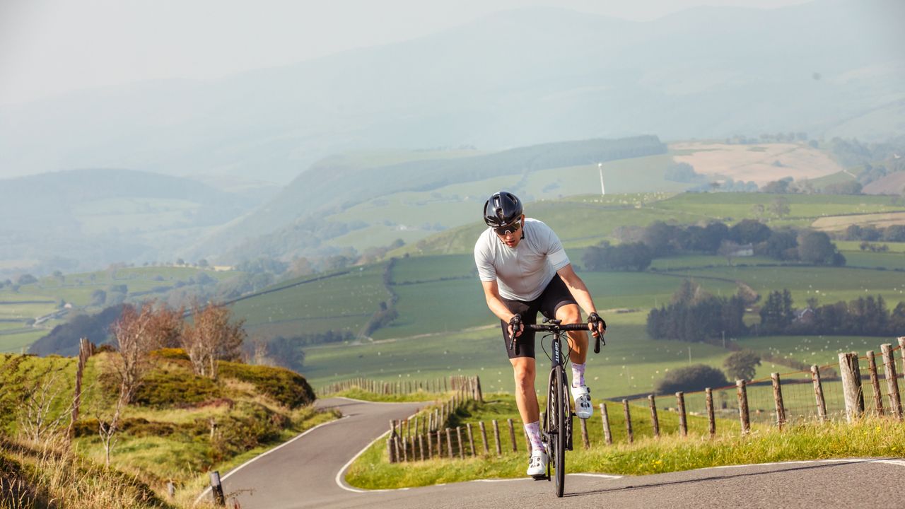 Image shows a rider cycling.