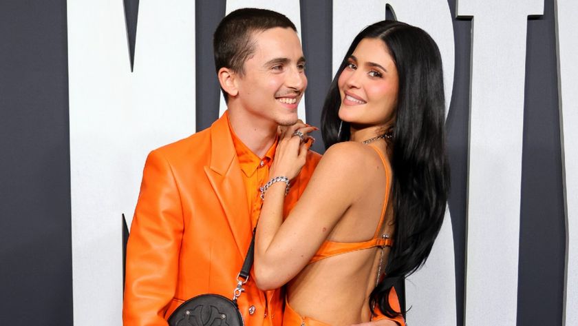 (L-R) Timoth&eacute;e Chalamet and Kylie Jenner attend the Los Angeles premiere of A24's "Marty Supreme" at Samuel Goldwyn Theater on December 08, 2025 in Beverly Hills, California. They're wearing matching orange outfits. 