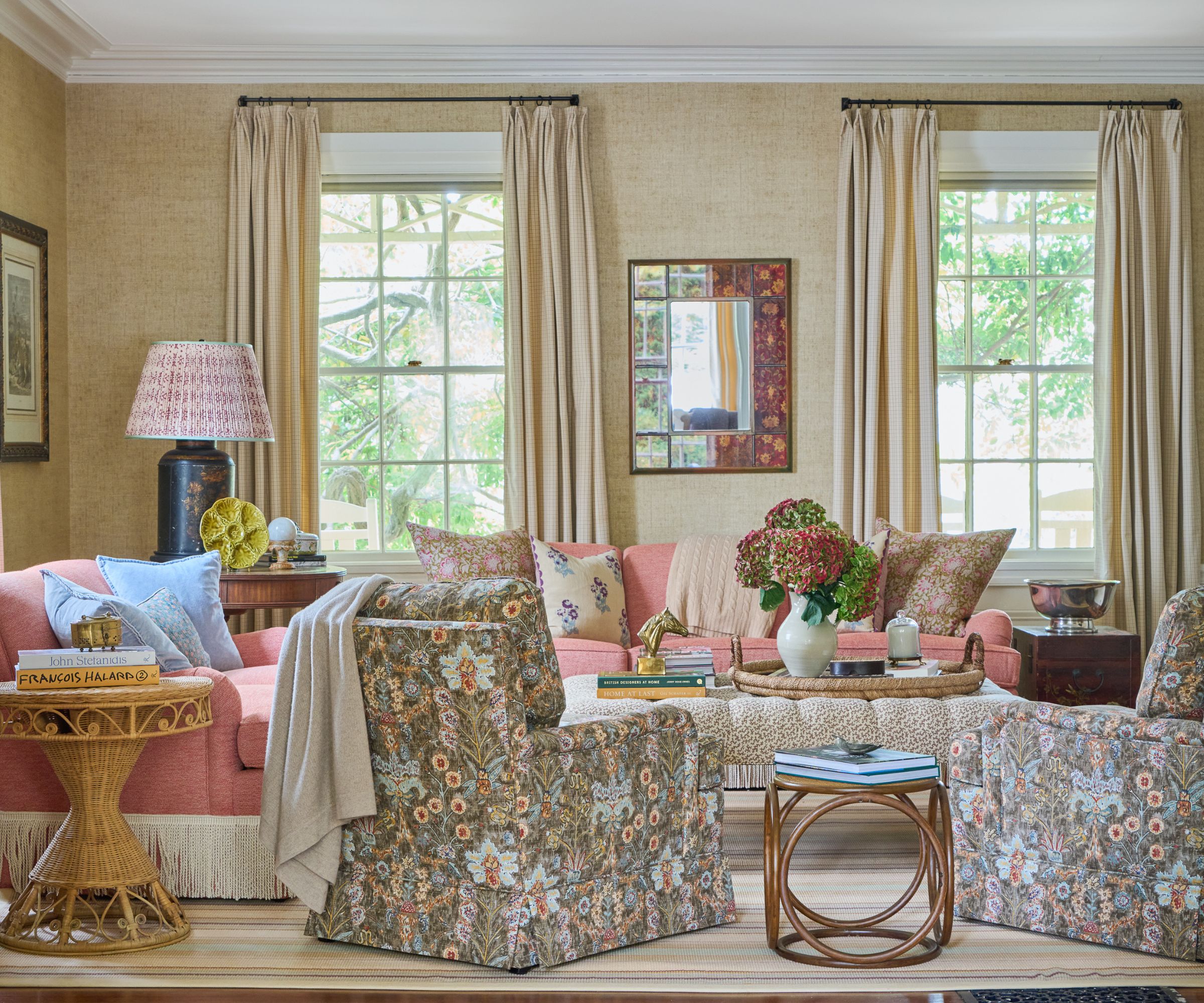 family living room with Thibaut grasscloth wallpaper in Wheat