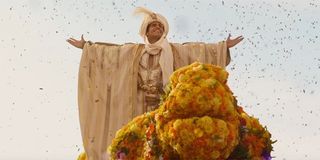 Prince Ali entering Agrabah in celebration in Aladdin