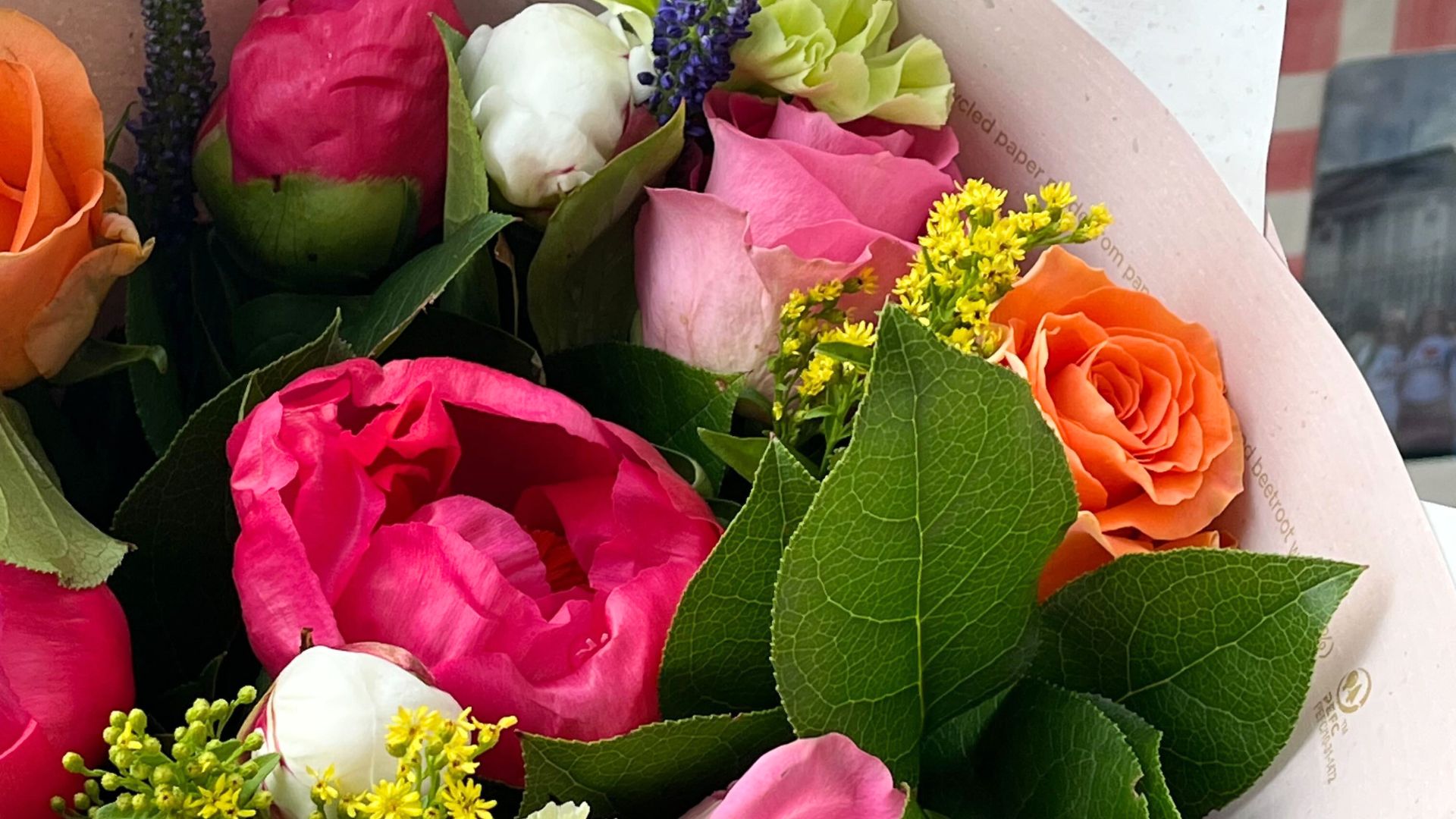 picture of peonies in bouquet with roses and other florals
