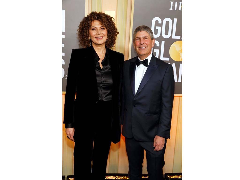 Donna Langley (l.), chairman, Universal Filmed Entertainment Group; and Jeff Shell, CEO, NBCUniversal, arrive at the Beverly Hilton Hotel for the Golden Globe Awards.