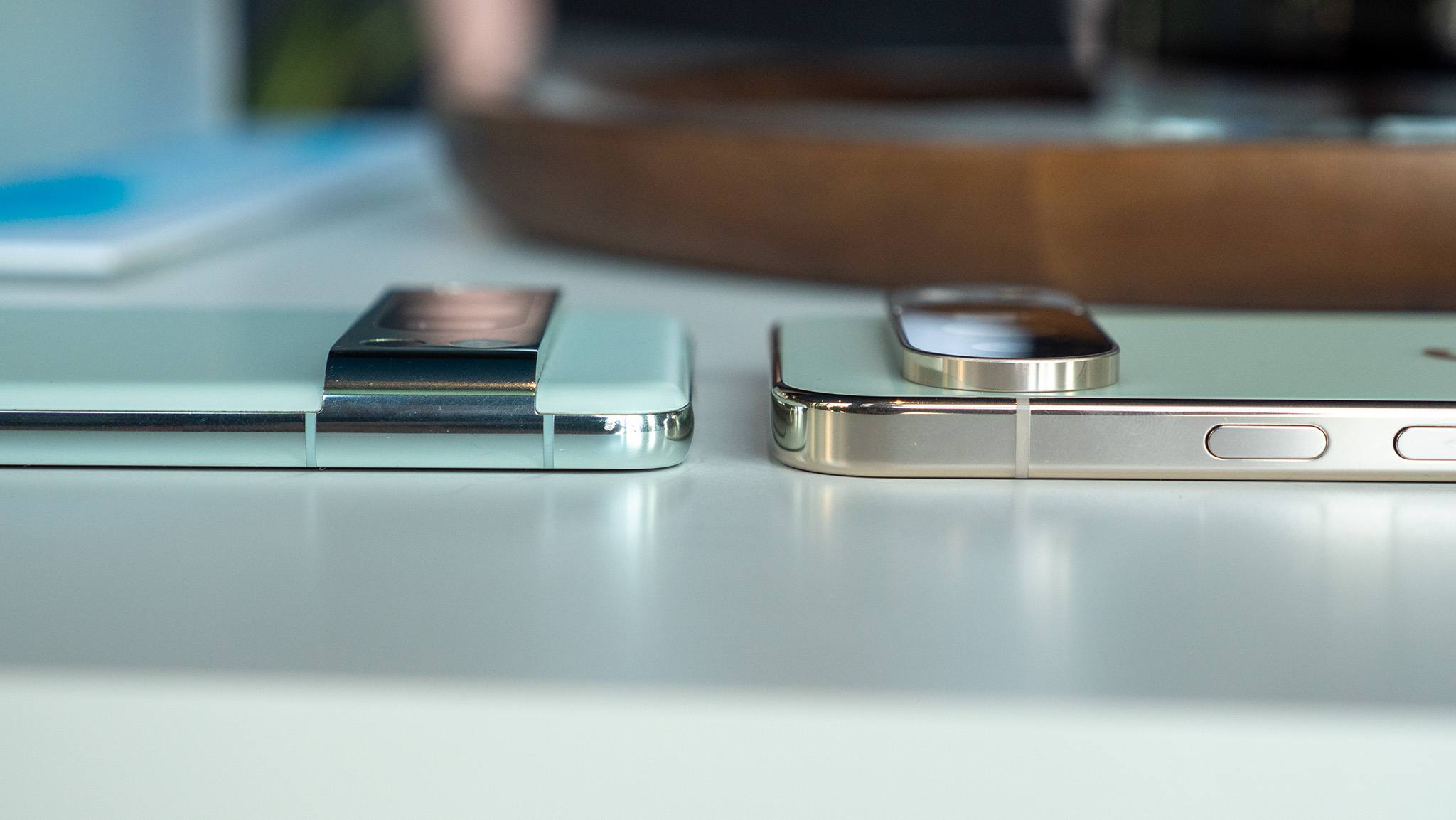 Comparing the mint Google Pixel 8 Pro's design to the jade Google Pixel 10 Pro XL's design