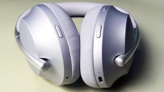 A close up of the bose noise cancelling headphone 700s in white