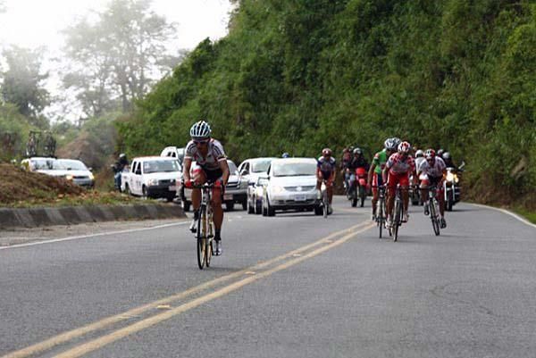 A rider tries a move on a climb.