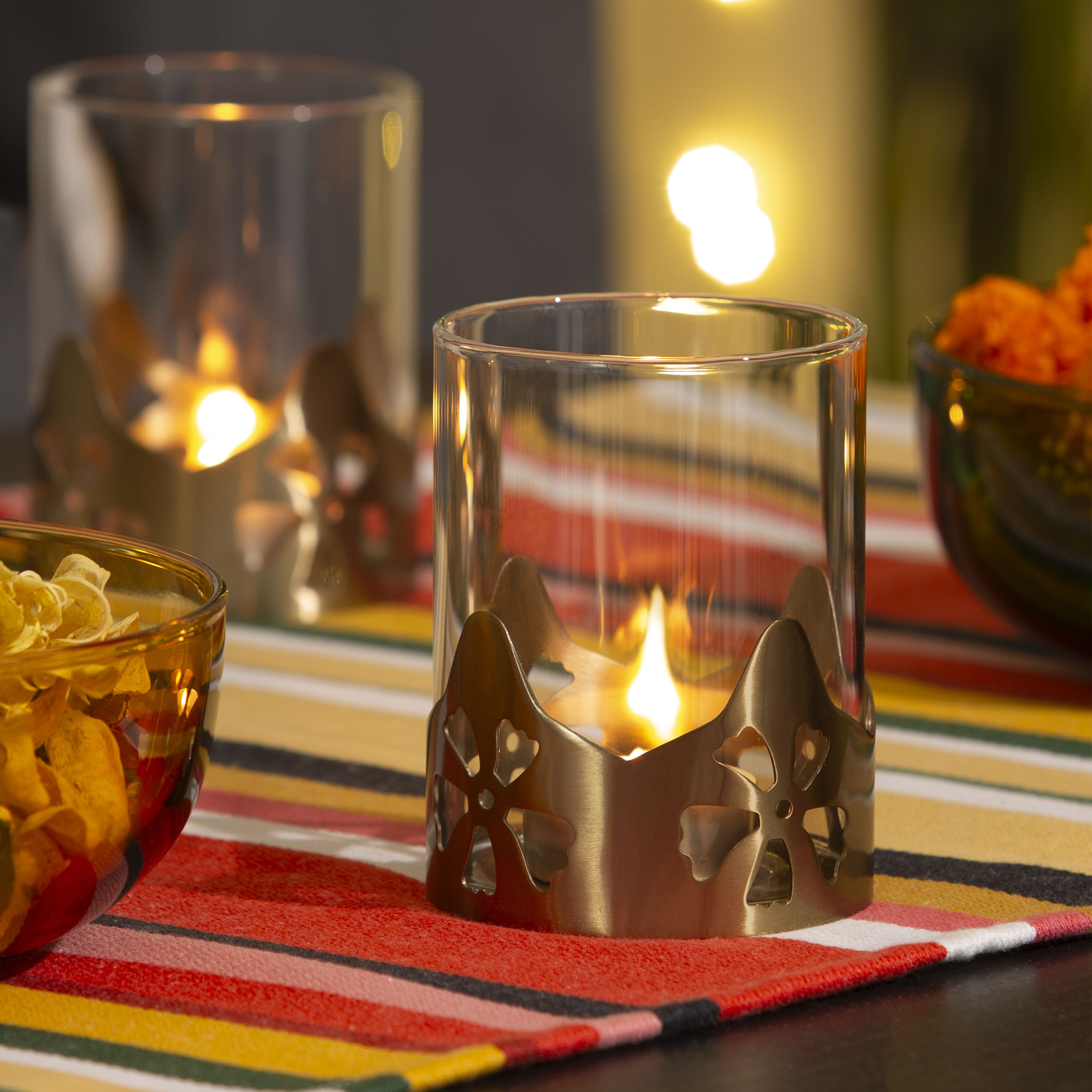 AROMATISK collection of candle holders, tea light holders, table runners and pillows
