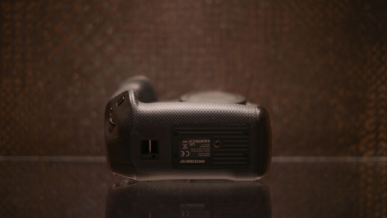 Canon EOS R1 against a dark background