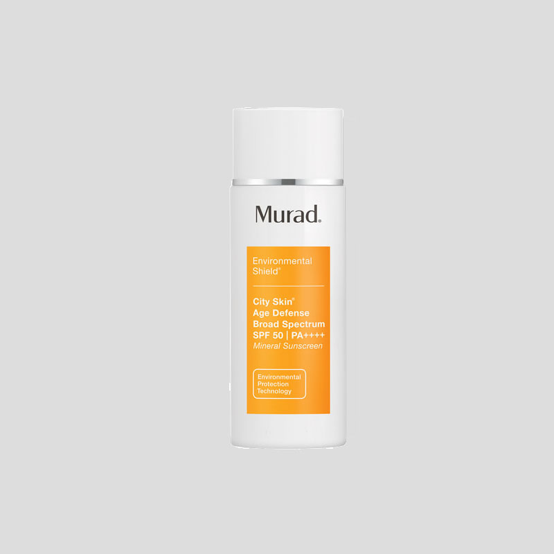Murad City Skin Age Defense Broad Spectrum SPF 50 in white tube against grey background