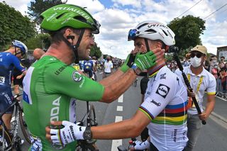 Mark Cavendish celebrates with Julian Alaphilippe after winning his second stage of the 2021 Tour de France
