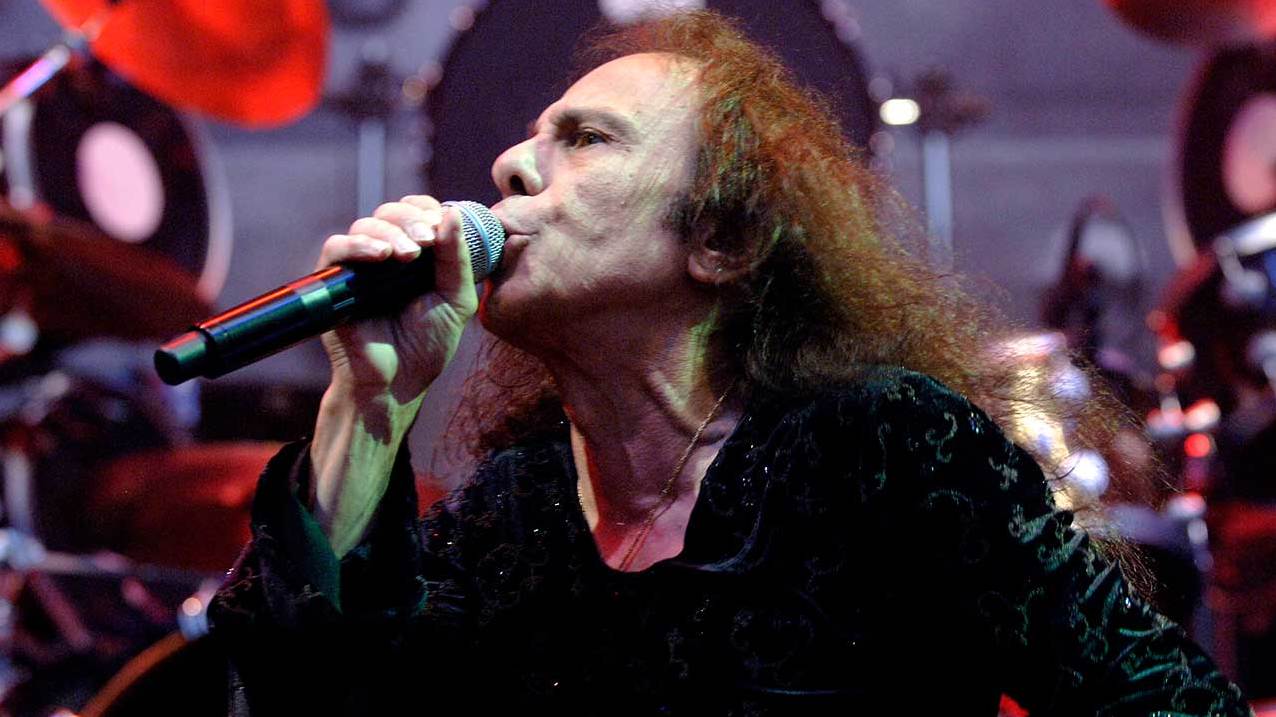 Ronnie James Dio singing into a microphone onstage