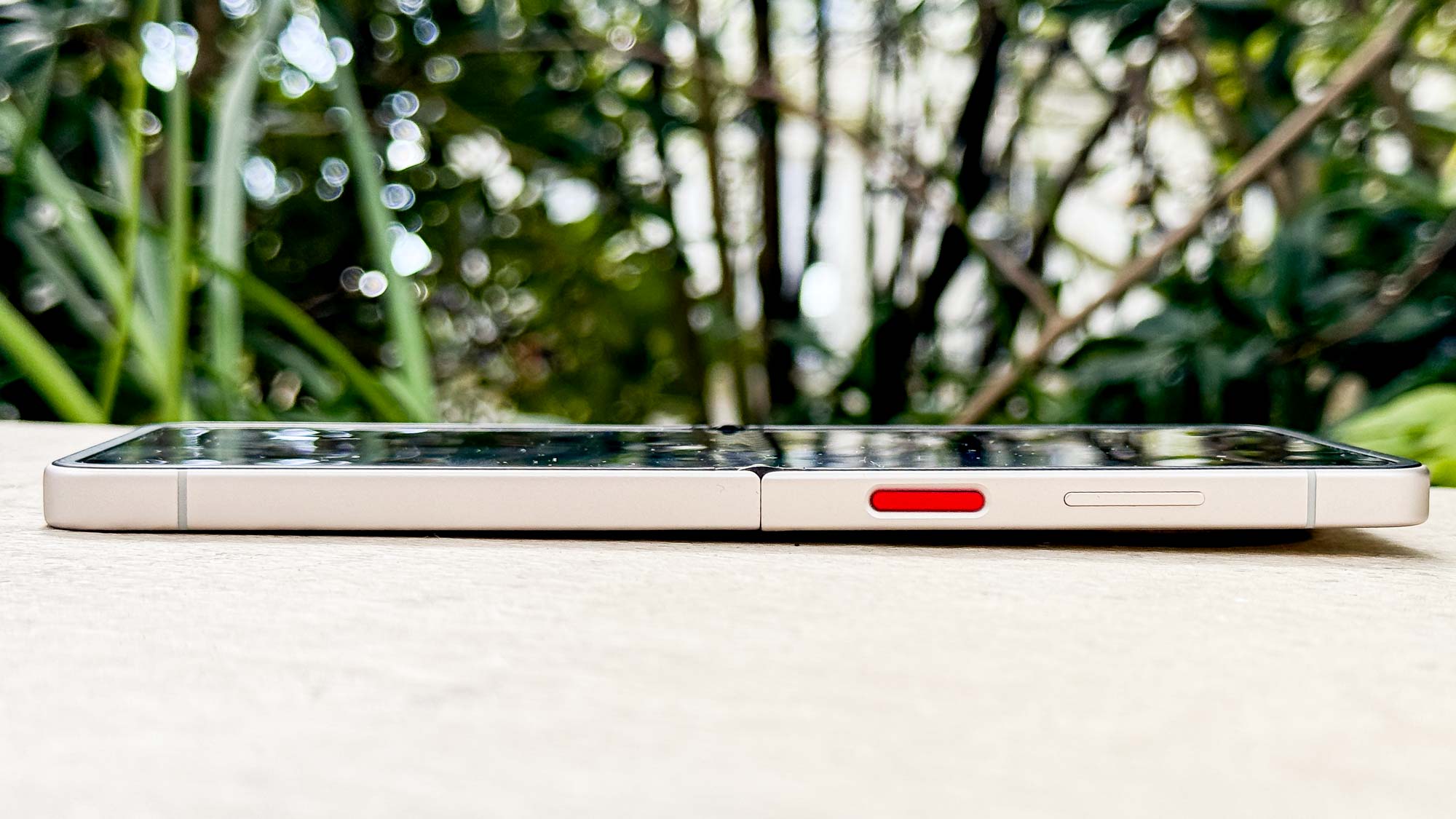 The Nubia Flip 5G's side rail, including its bright red power button