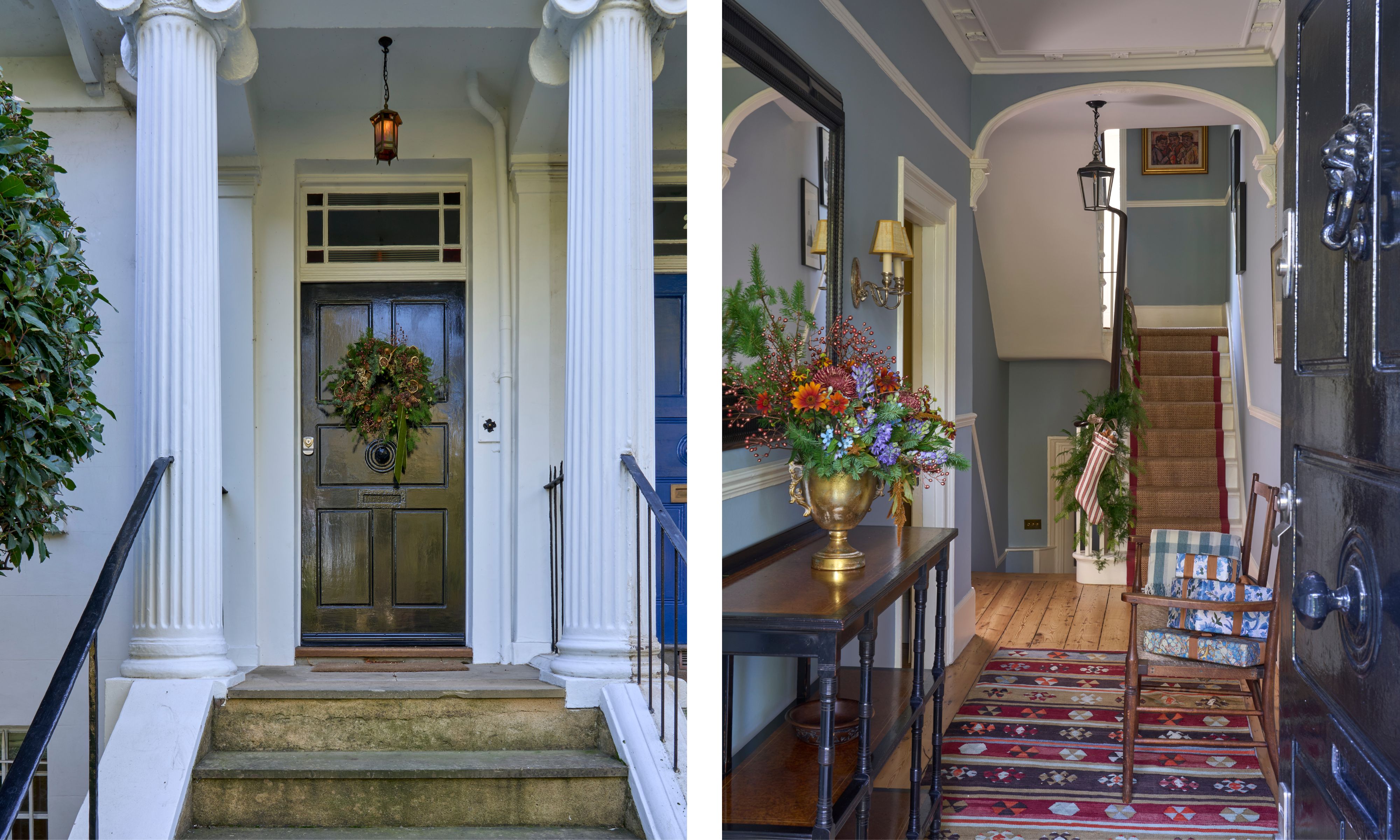Split image: The left shows a traditional black front door with a festive wreath, framed by large white columns. The right shows the entrance hall with pale blue-grey walls, a wooden floor, and a staircase covered with a multi-colored patterned runner.